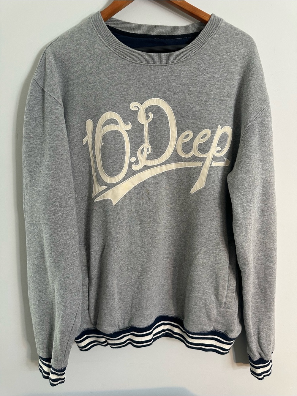 10.Deep Gray Crewneck Sweatshirt with Cream Logo and Navy Trim